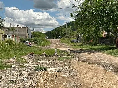 Nanah cobra drenagem e pavimentação asfáltica em rua do Aeroporto