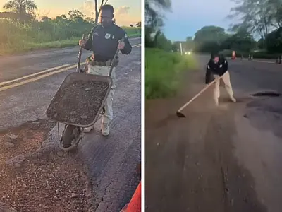 Agentes da PRF tapam buracos com cascalhos na BR-376 para evitar acidentes