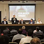 Simpósio defende maior adesão municipal em programa de regularização fundiária